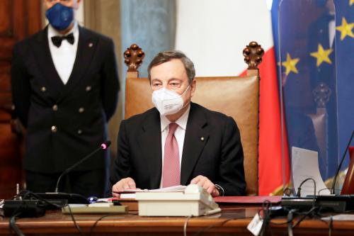 FILE PHOTO: New Italian Premier Mario Draghi presides over his first cabinet of ministers reunion after the swearing-in ceremony, at Chigi Palace Premier's office, in Rome, Italy February 13, 2021. Andrew Medichini/Pool via REUTERS/File Photo