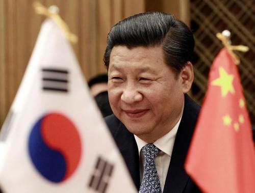 Chinese President Xi Jinping smiles during a meeting with South Korean National Assembly speaker Chung Ui-hwa at the National Assembly in Seoul July 4, 2014.