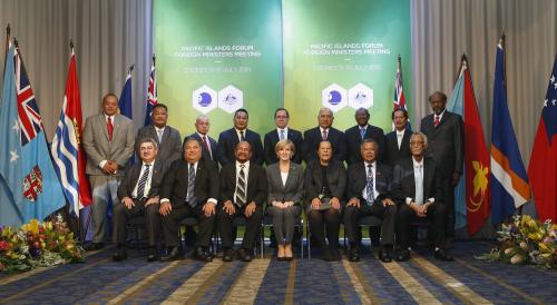 Australian Foreign Minister Julie Bishop (seated, C) poses for a group photo among representatives from Pacific nations at the Pacific Islands Forum Foreign Ministers meeting in Sydney, July 10, 2015.