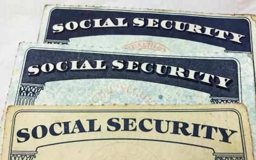 U.S. Social Security card designs over the past several decades are shown in this photo illustration taken on January 7, 2017. REUTERS/Hyungwon Kang