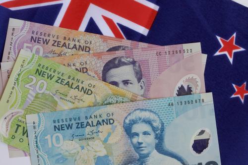 New,Zealand,Flag,And,Money,Together.